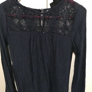 Blouse with lace by the neck line!